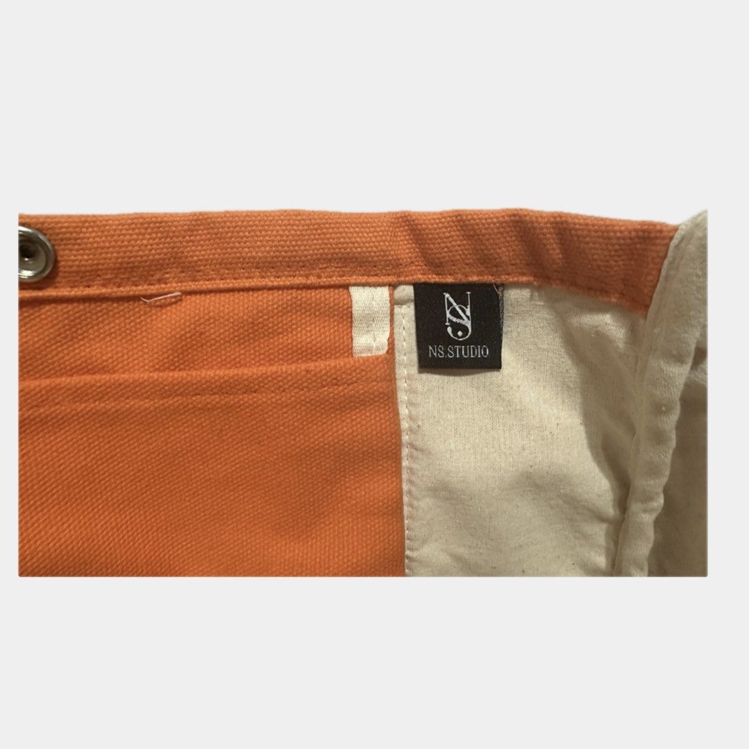 NS Studio summer tote bag in Tangerine (Category: Tote Bags) located in Paranaque City. Submitted by annvzsn (Listing ID 1468498214, Image 3). Description: Color: tangerine Size: regular/normal Material: canvas Bought in: Thailand Condition: like new Details: - Ideal for everyday use - Fits essentials easily - Snap button closure - Inner pocket - Structured base ♡ Never used this honestly, it just got wrinkled for how badly I stored it but using 