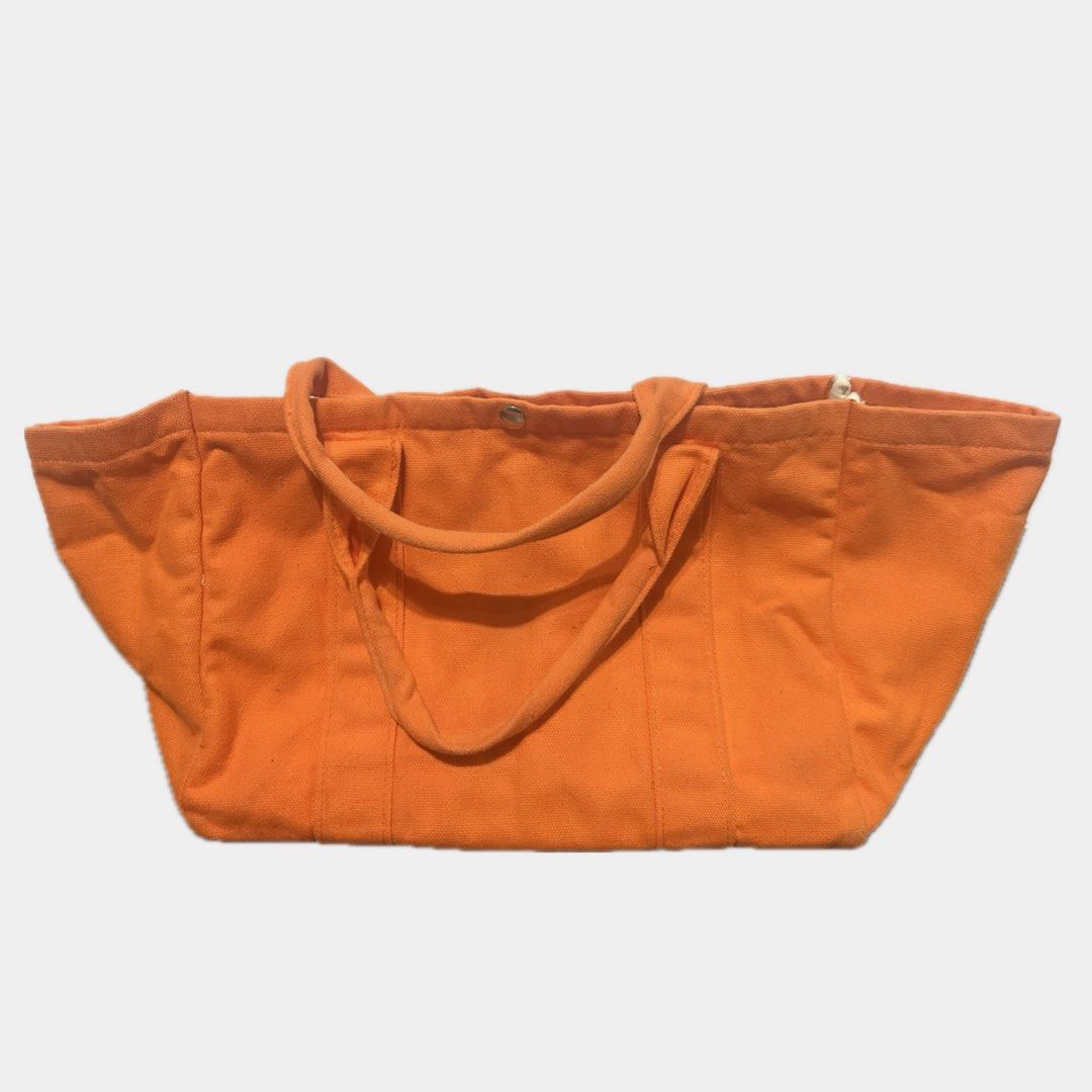 NS Studio summer tote bag in Tangerine (Category: Tote Bags) located in Paranaque City. Submitted by annvzsn (Listing ID 1468498214, Image 2). Description: Color: tangerine Size: regular/normal Material: canvas Bought in: Thailand Condition: like new Details: - Ideal for everyday use - Fits essentials easily - Snap button closure - Inner pocket - Structured base ♡ Never used this honestly, it just got wrinkled for how badly I stored it but using 
