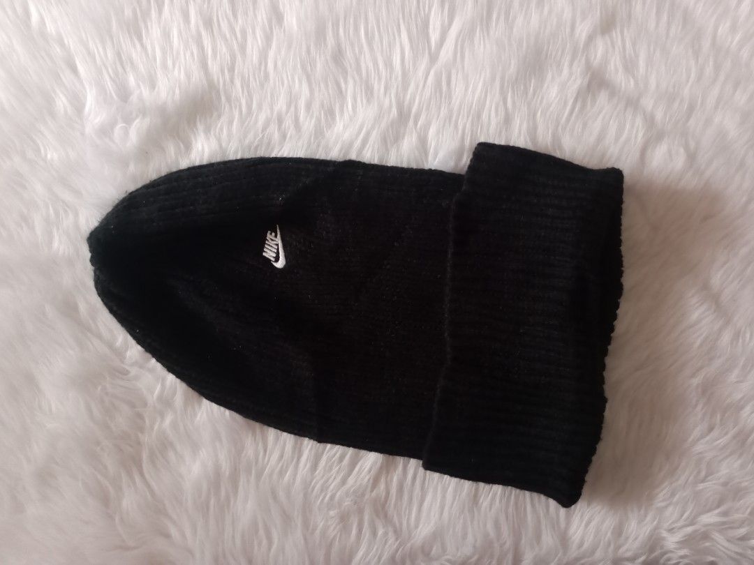NSW Cuffed Beanie (Category: Caps & Hats) located in Santa Rosa. Submitted by thethriftersshop (Listing ID 1468291259, Image 3). Description: - Brand: Nike - Style: Ribbed knit beanie with fold-over cuff - Color: Classic black with small white embroidered logo - Material: Warm, stretchy winter fabric - Details: Internal tag with style code DA1803-010 - Condition: Brand new / Excellent quality.