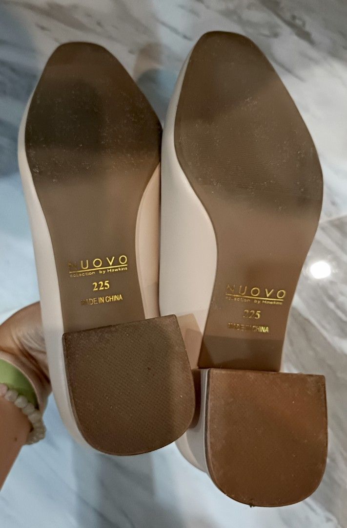 Nude Block Heels (Category: Heels) located in Pasig City. Submitted by Quelle (Listing ID 1468390978, Image 2). Description: - Brand: NUOVO by Hawkins - Color: Nude - Size: 225mm - Heel: Comfortable chunky block heel - Toe Design: Classic round toe - Condition: Minimal wear on bottom tread, clean insides with branded insoles - Worn twice for weddings - Very comfortable to wear but not my style.