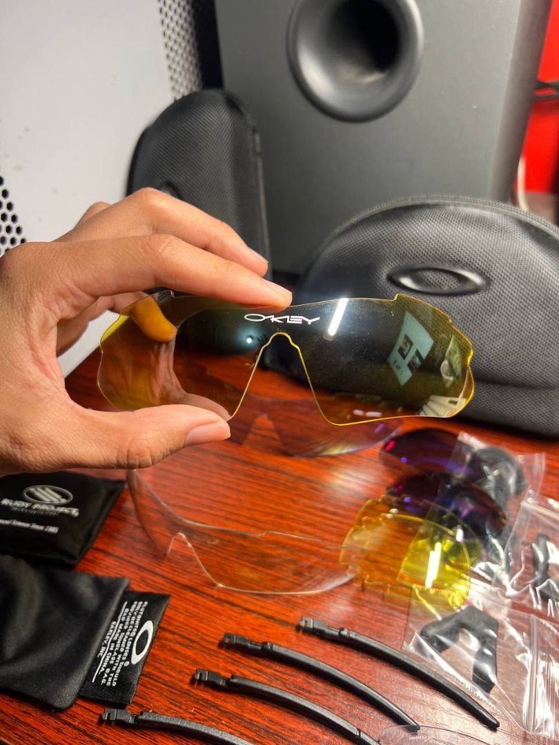 Oakley & Rudy project Accesories Set (Category: Sunglasses & Eyewear) located in Baguio. Submitted by carlbenta (Listing ID 1468428156, Image 2). Description: - Complete Oakley sunglasses kit with multiple interchangeable lenses - Includes clear, yellow, orange, and tinted shades for any lighting condition - Plutonite lenses for premium UV protection and clarity - Comes with 2 hard cases, soft microfiber bags, spare temples, and a retention strap