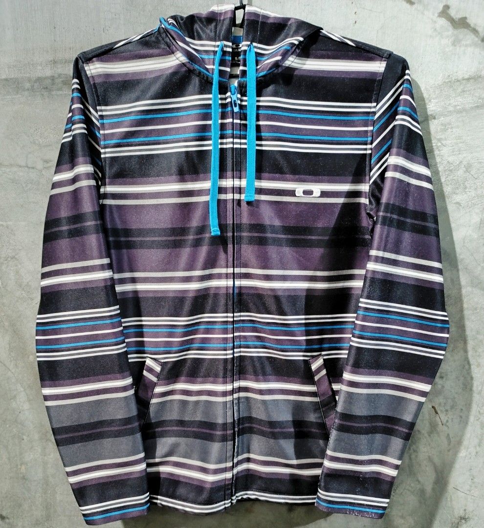 OAKLEY Multi-colored Stripe Design Full Zip Hoodie Jacket (Category: Coats, Jackets and Outerwear) located in Bacoor. Submitted by nineties_kid (Listing ID 1468459342, Image 2). Description: <==• OAKLEY Multi-colored Stripe Design Full Zip Hoodie Jacket Size: Small Shoulder width: 16.5 inches Sleeve length: 26.5 inches Jacket width: 19 inches Jacket length: 28 inches ______________ ▶LBC Cash on Pick-up (C.O.P) Offer nation-wide delivery, as long 