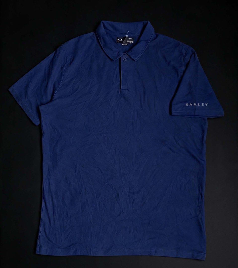 Oakley Polo Shirt (Category: Tshirts & Polo Shirts ) located in Meycauayan. Submitted by trinidad_trading (Listing ID 1468397600, Image 1). Description: Oakley Polo Shirt Size XL Dimensions 22X29 Condition 9/10 Price 1,000+Shipping Fee.