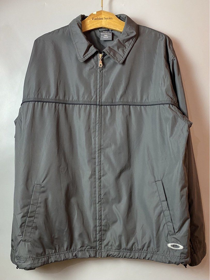 OAKLEY Software Tech Jacket- 90s (Category: Coats, Jackets and Outerwear) located in Quezon City. Submitted by loloyz123 (Listing ID 1468454087, Image 1). Description: OAKLEY Software Tech Jacket- 90s Condition: Very good Color rate: 9.8/10 Color: Gray/ Nylon Size: Xlarge L: 30 W: 25.5 inches.
