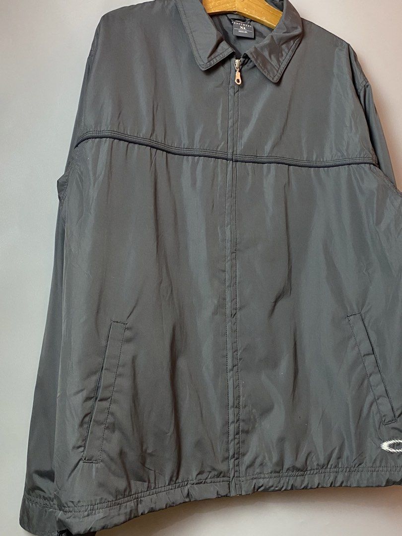 OAKLEY Software Tech Jacket- 90s (Category: Coats, Jackets and Outerwear) located in Quezon City. Submitted by loloyz123 (Listing ID 1468454087, Image 3). Description: OAKLEY Software Tech Jacket- 90s Condition: Very good Color rate: 9.8/10 Color: Gray/ Nylon Size: Xlarge L: 30 W: 25.5 inches.
