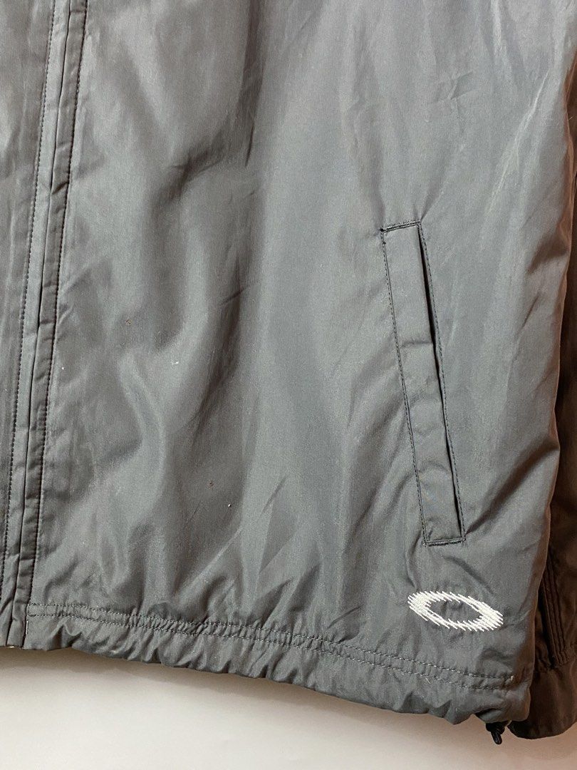 OAKLEY Software Tech Jacket- 90s (Category: Coats, Jackets and Outerwear) located in Quezon City. Submitted by loloyz123 (Listing ID 1468454087, Image 2). Description: OAKLEY Software Tech Jacket- 90s Condition: Very good Color rate: 9.8/10 Color: Gray/ Nylon Size: Xlarge L: 30 W: 25.5 inches.