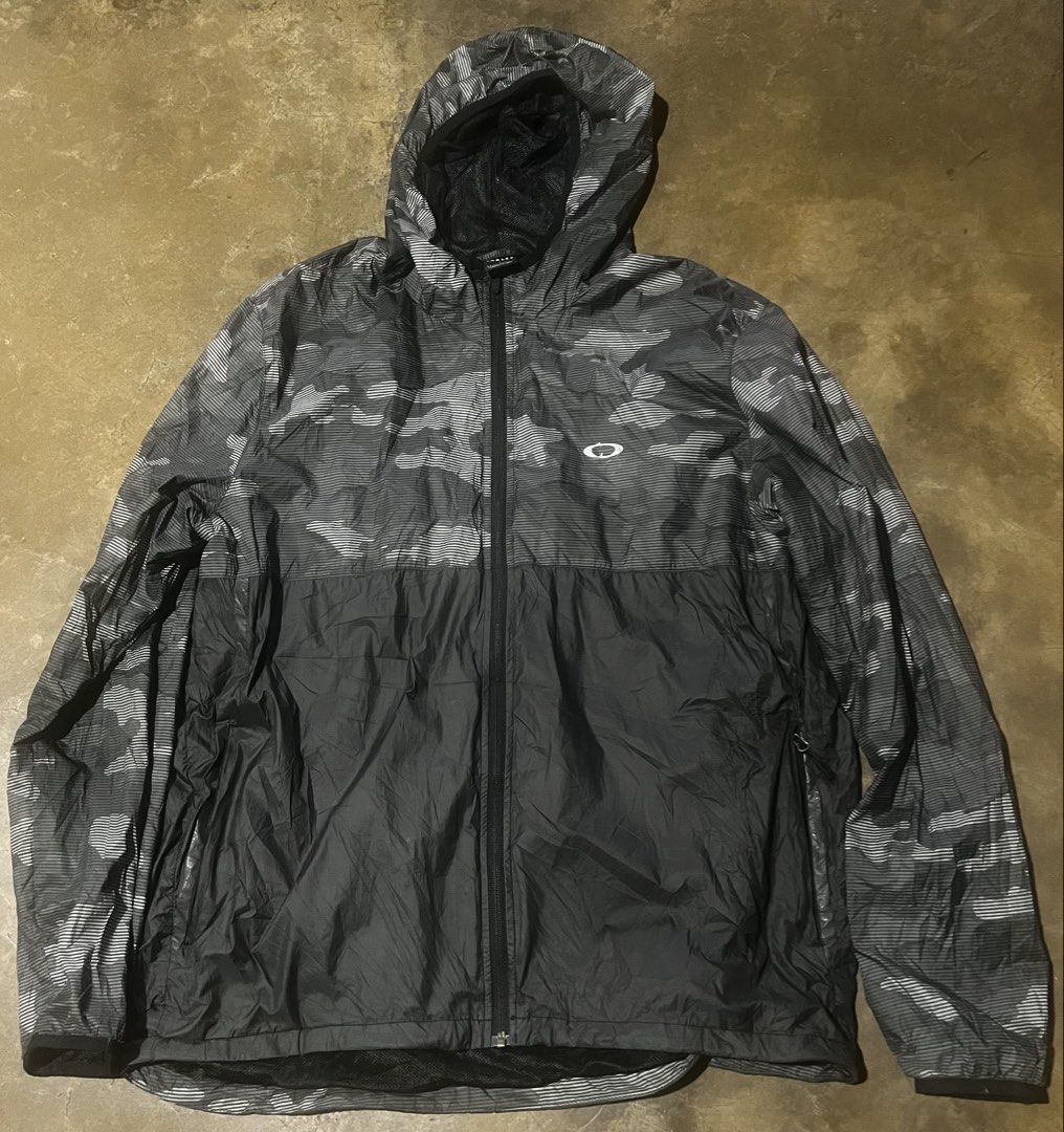 Oakley Wind Breaker Camouflage (Category: Coats, Jackets and Outerwear) located in Meycauayan. Submitted by trinidad_trading (Listing ID 1468397033, Image 1). Description: Oakley Wind Breaker Camouflage Size XXL Dimensions 25X30 Condition 9/10 Price 1,500+Shipping Fee.