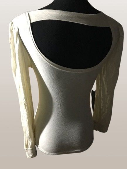 OFF WHITE BLOUSE TOP (Category: Longsleeves) located in Marikina City. Submitted by minimalistmanila (Listing ID 1468405984, Image 2). Description: Off white stretchy cotton blouse. Fits S/M. Jersey fabric. Might need a wash as kept in storage. Order now!.