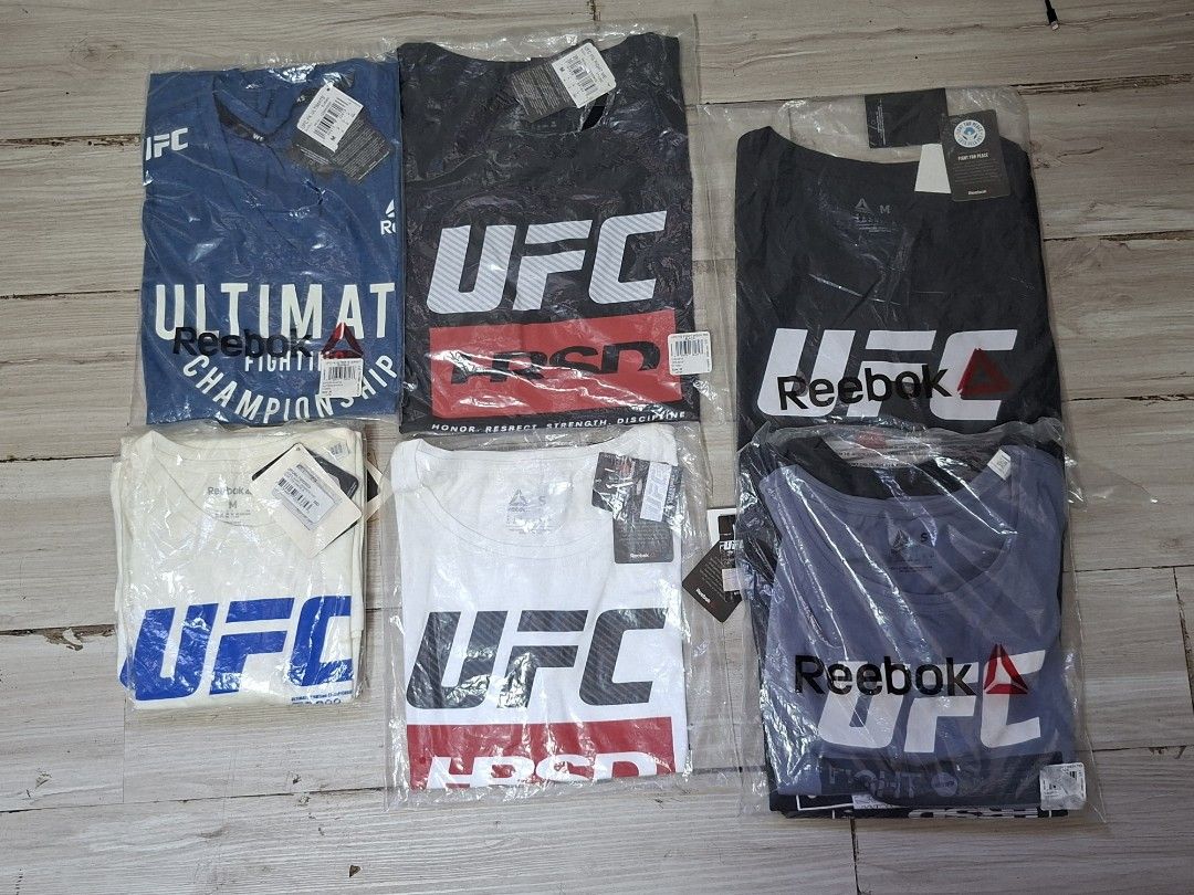 Official UFC Reebok Tshirts (Category: Shirts) located in San Fernando. Submitted by silverforest-63a2 (Listing ID 1468327998, Image 1). Description: Official UFC Reebok Tshirts. 1000php each, 2500php for 3 pieces for females Available Stock: -2nd photo, white: 1 small, 1 medium -3rd photo, black: 2 small, 1 medium -4th photo, black+red: 1 medium -5th photo, blue: 1 medium -6th photo, grayish blue: 1 small Mode/s of payment: Gcash or COD/COP (For
