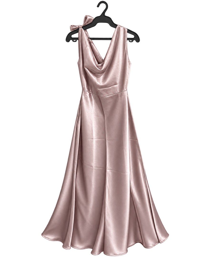 Off-the-Shoulder Silk Party Dress (Category: Dresses) located in Quezon City. Submitted by dk1995 (Listing ID 1468401134, Image 1). Description: - Style: Off-the-shoulder party dress with a gorgeous flared long skirt - Color: Pinkish silver - Material: Premium silk fabric with a smooth, luxurious drapei - Details: Elegant cowl neckline and a charming side bow detail on the shoulder - Size: XL vietnam size (size down) - Condition: Excellent Worn o