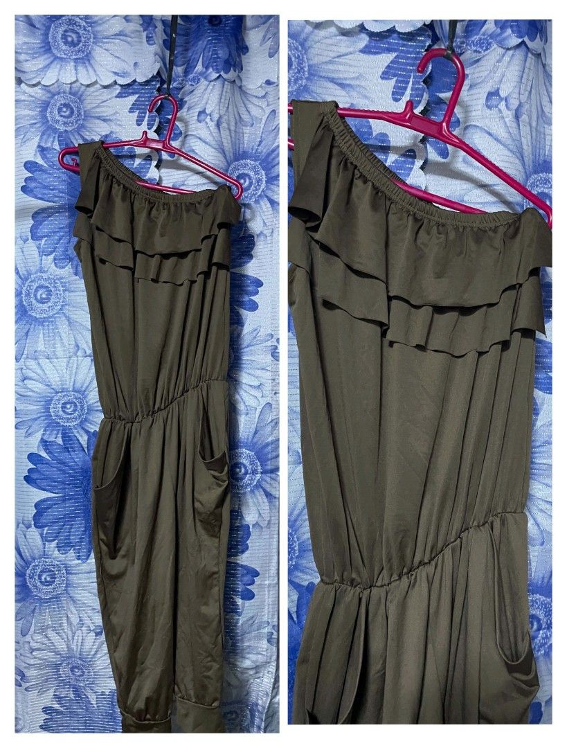 Olive Green One-Shoulder Ruffle Jumpsuit (Category: Jumpsuits) located in Manila. Submitted by arimad.clo (Listing ID 1468307255, Image 1). Description: - Color: Olive green - Style: One-shoulder jumpsuit with layered ruffles - Fit: Relaxed through the legs with elasticized neckline and waistband - Features: Convenient side pockets and easy slip-on design - Material: Soft and stretchy fabric for all-day comfort.