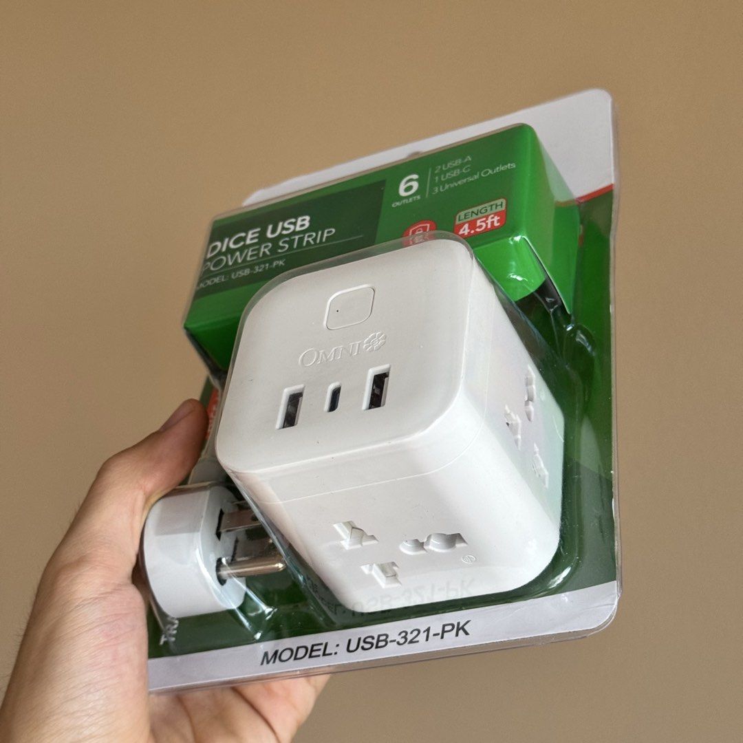 OMNI Dice USB Power Strip Model USB-321-PK (Category: Cables & Adaptors) located in Davao. Submitted by silverearth_3394b2 (Listing ID 1468447287, Image 3). Description: - Brand: OMNI - Model: USB-321-PK (Dice USB Power Strip) - Color: White cube design - Cord Length: 4.5ft travel extension cord - Ports & Outlets: 3 universal outlets, 2 USB-A ports, 1 USB-C port - Features: Compact space-saver, super safety protection - Condition: Factory sealed 