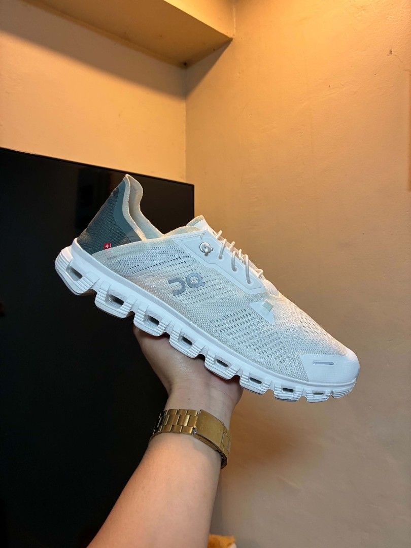 On Cloud Running Shoes White (Category: Sneakers) located in Manila. Submitted by silentbear-c433 (Listing ID 1468394118, Image 1). Description: - Brand: On Cloud - Colorway: White with stylish dark green heel panels - Technology: Signature cloud cushioning for all-day comfort - Fit & Feel: Super lightweight and breathable mesh upper - Features: Hassle-free speed lacing system - Condition: Clean white rubber outsoles, ready for daily wear.