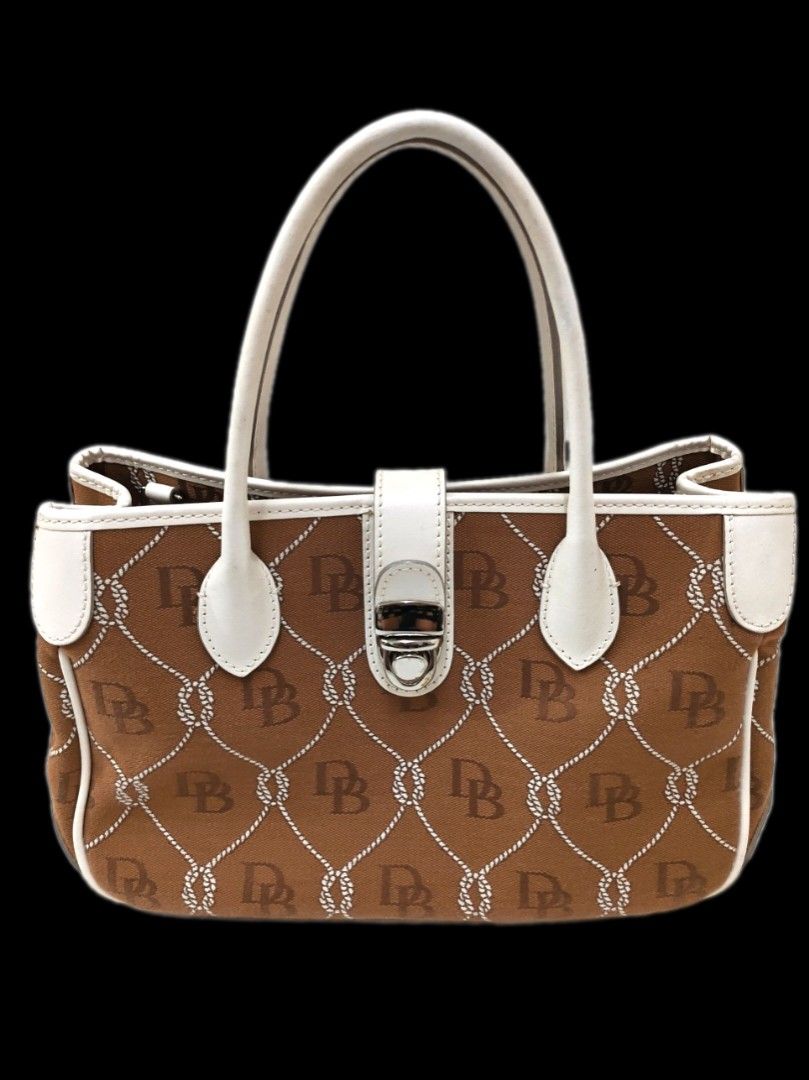 AUTHENTIC DOONEY & BOURKE MONOGRAM SEMI - MEDIUM TOTE BAG BROWN WHITE (Category: Luxury Bags & Wallets) located in Quezon City. Submitted by sparkys.joy_88 (Listing ID 1467716339, Image 1). Description: - Authentic Dooney & Bourke brown and white monogram handbag - Stylish rope lattice design with durable white leather trim and dual handles - Nice and classic color wear - Secure silver-tone hardware with classic lock closure - Structured bottom e