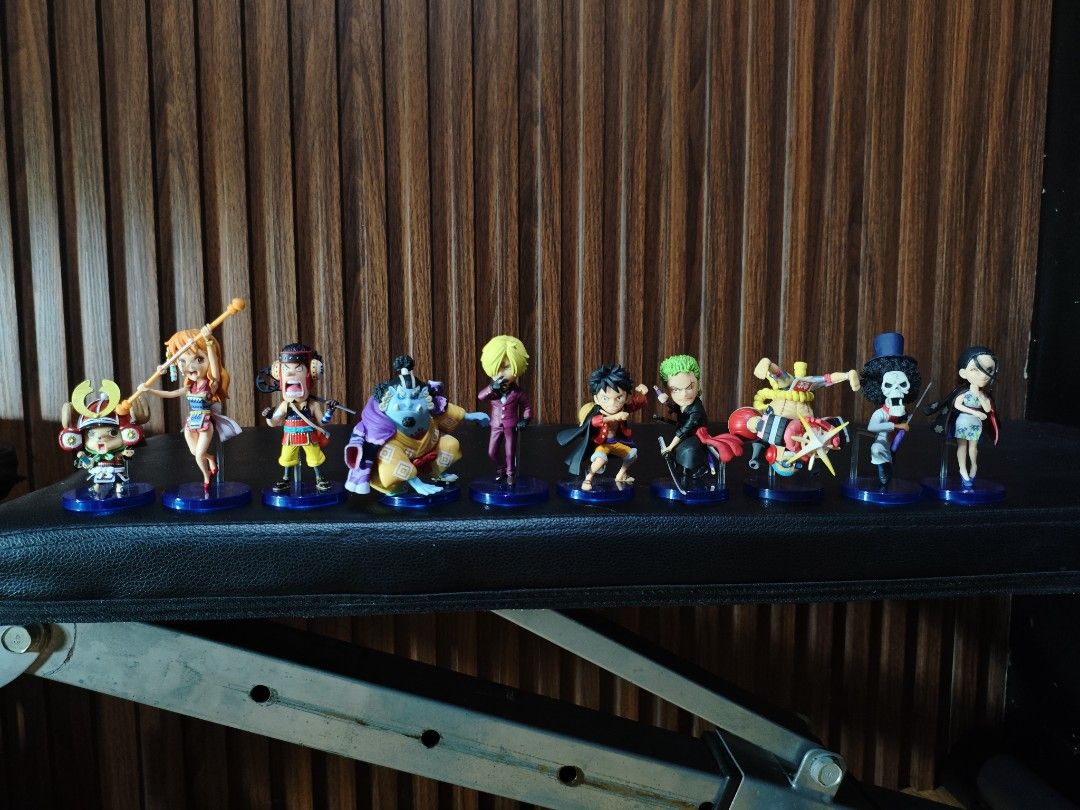 One Piece Straw Hat Crew WCF (Category: Figurines & Statues) located in Obando. Submitted by welhaseyo (Listing ID 1468440169, Image 1). Description: - Complete set of 10 One Piece Wano Country mini figures (Luffy, Zoro, Sanji, Chopper, Nami, Usopp, Jinbe, Franky, Brook, Robin) - Each figure comes mounted on a blue circular base with a support stand - Stands a few inches tall with detailed paintwork on outfits and dynamic poses - Perfect shelf di