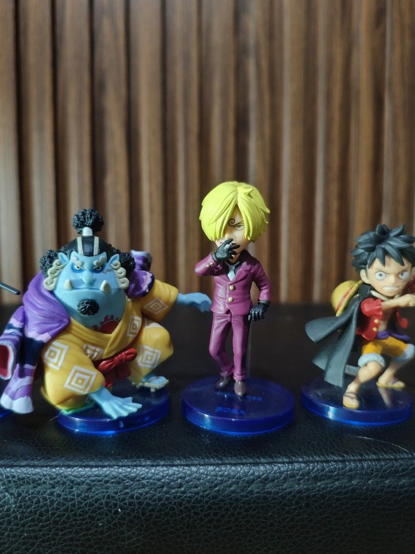 One Piece Straw Hat Crew WCF (Category: Figurines & Statues) located in Obando. Submitted by welhaseyo (Listing ID 1468440169, Image 2). Description: - Complete set of 10 One Piece Wano Country mini figures (Luffy, Zoro, Sanji, Chopper, Nami, Usopp, Jinbe, Franky, Brook, Robin) - Each figure comes mounted on a blue circular base with a support stand - Stands a few inches tall with detailed paintwork on outfits and dynamic poses - Perfect shelf di