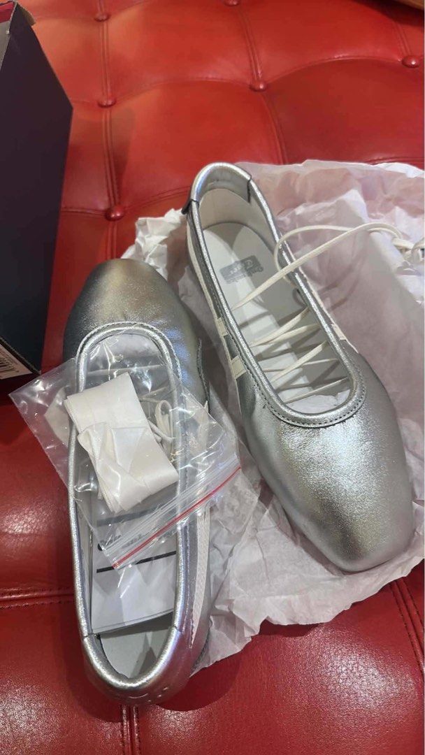 Onitsuka Tiger Gymnarina Silver (Category: Sneakers) located in Cavite. Submitted by casadeukay (Listing ID 1468451862, Image 3). Description: - Brand/Model: Onitsuka Tiger Gymnarina - Color: Metallic Silver with classic side stripes - Size: Women's US 6.5 / EUR 37.5 / UK 4.5 / 23.5 cm - Condition: Worn twice, practically untouched and super clean - Inclusions: Original box, paper stuffing, and sealed extra set of ribbon laces.