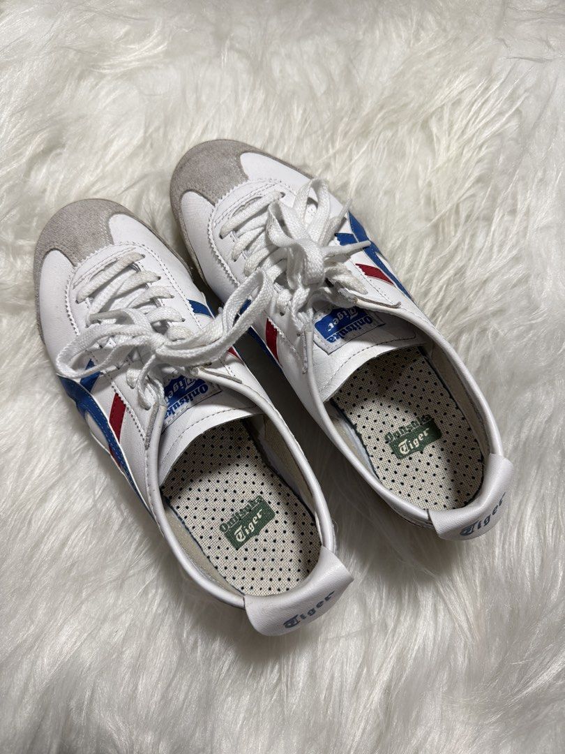 Onitsuka Tiger Mexico 66 White Blue Red (Category: Sneakers) located in Las Pinas. Submitted by juls_mp (Listing ID 1468378245, Image 3). Description: - Brand: Onitsuka Tiger - Model: Mexico 66 - Colorway: White with iconic blue and red stripes - Size: US 6.5 / EU 39.5 / UK 5.5 / CM 25.0 - Features: Low-top silhouette, suede toe overlays, unique polka dot insoles, clean white laces - Condition/Details: Crisp branding on tongue and heel flap, made