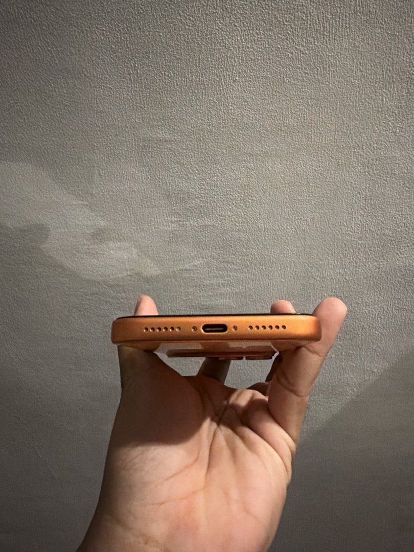 Orange iPhone replica with box (Category: iPhone 17 Series) located in Paranaque City. Submitted by jonald111 (Listing ID 1468496171, Image 3). Description: Iphone 17 Pro Max 512gb Ntc Approved Factory Unlocked Cosmic Orange Complete Package.