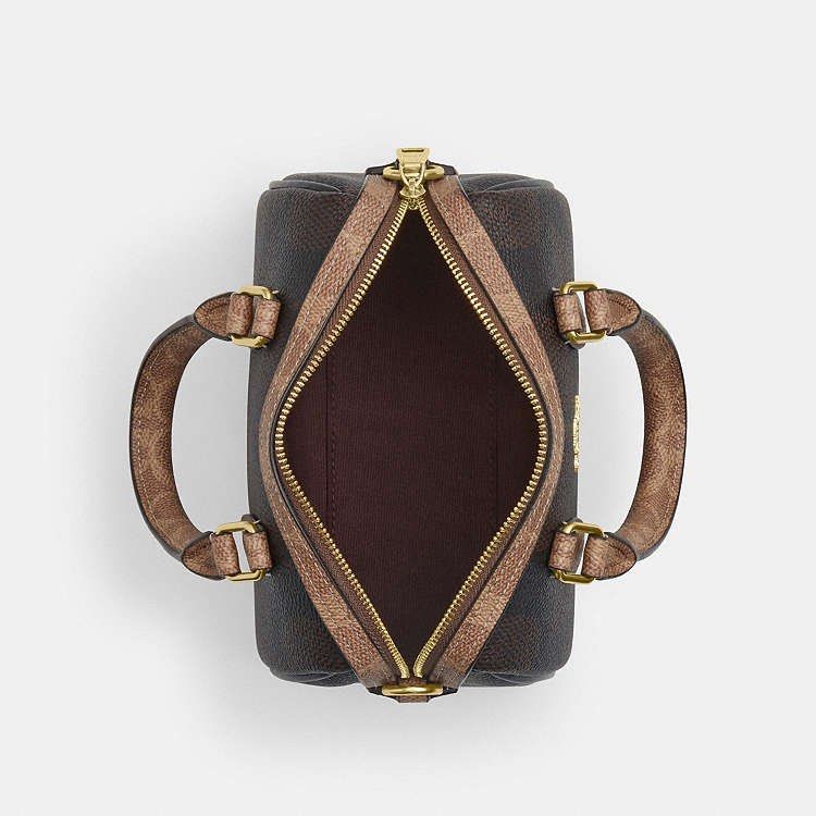 💯ORIGINAL COACH MINI ROWAN GOLD WALNUT TAN (Category: Cross-body Bags) located in Quezon City. Submitted by ashongsstore (Listing ID 1468289172, Image 3). Description: ✨ Meet the C0*ch Mini Rowan Crossbody! ✨ 🇵🇭AVAILABLE🇵🇭New Color Small in size but big on style — this little beauty is perfect for days when you just need the essentials. 👜 Crafted with C0*ch’s signature detail and timeless design, the Mini Rowan is your go-to for effortless 