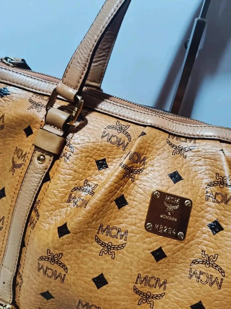Original MCM Cognac Tote bag (Category: Shoulder Bags) located in Cabuyao City. Submitted by secondhand.shop.ph (Listing ID 1468444682, Image 2). Description: Sale❗️Sale❗️Sale❗️ Original MCM Medium PVC/ genuine leather trim 📌First to pay!.