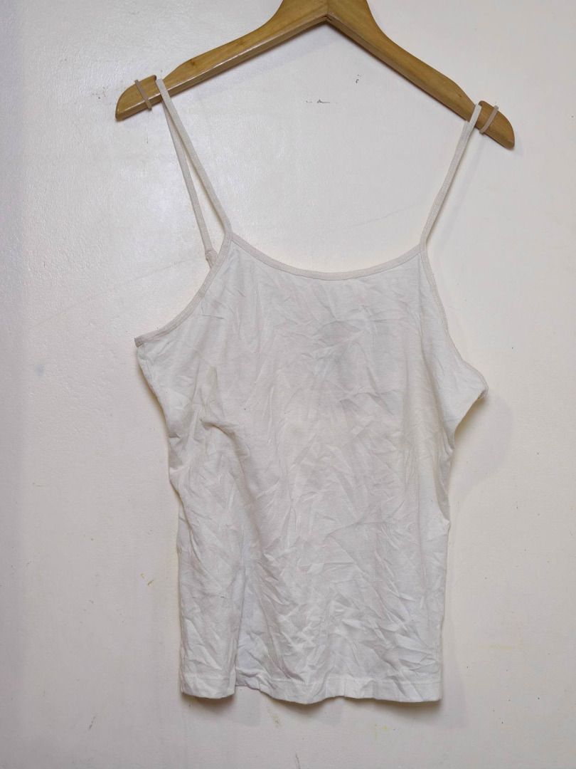 ORIGINAL SONOMA Off-White Basic Cami Tank Top - Layering Essential (Category: Sleeveless) located in Morong. Submitted by katiesmodernthrift (Listing ID 1468370363, Image 3). Description: - Color: Classic White - Style: Basic layering camisole top with adjustable double straps - Detail: Cute metallic thread accent along the neckline - Material: 55% Cotton, 45% Polyester (soft, breathable, and durable) - Condition: Excellent / Brand New - Perfect 