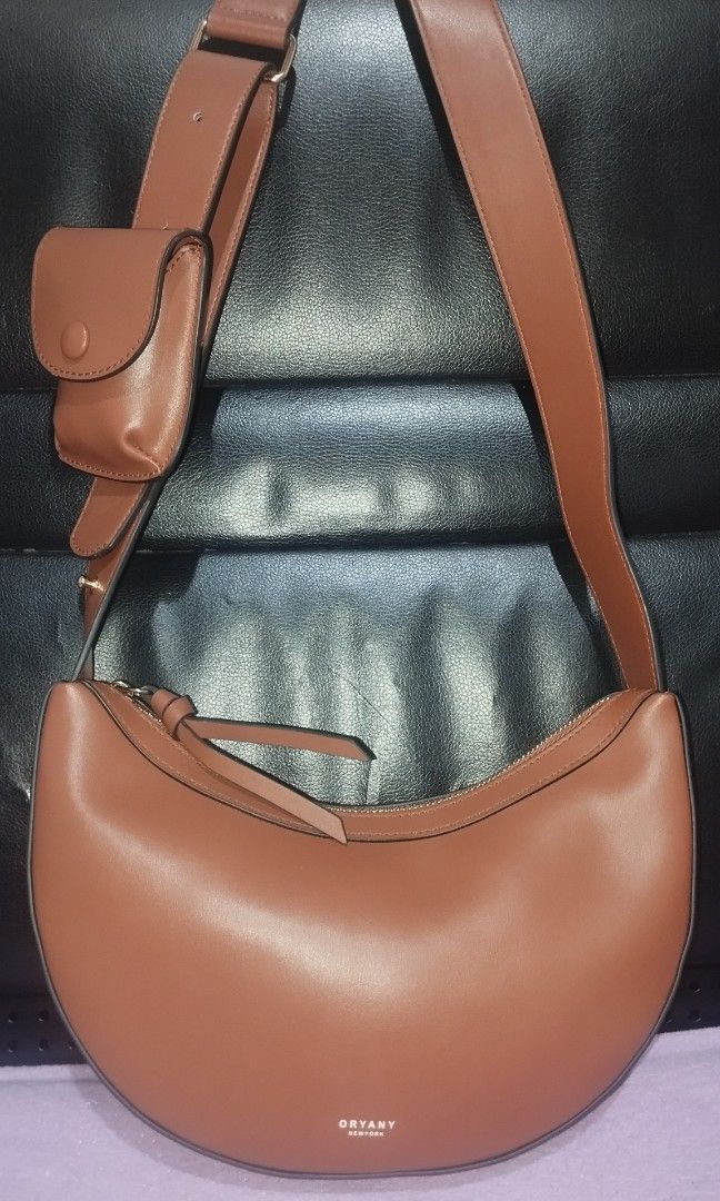 Oryany New York Sling Bag (Category: Cross-body Bags) located in Taguig. Submitted by bellecabano (Listing ID 1468393346, Image 2). Description: Oryany New York Sling Bag nothing to declare at all parang bago... bihira po sa second hand ung may kasama pa wallet *** kunin nyo to ganda nya in actual pati kulay lalamove, LBC COP or J&T.