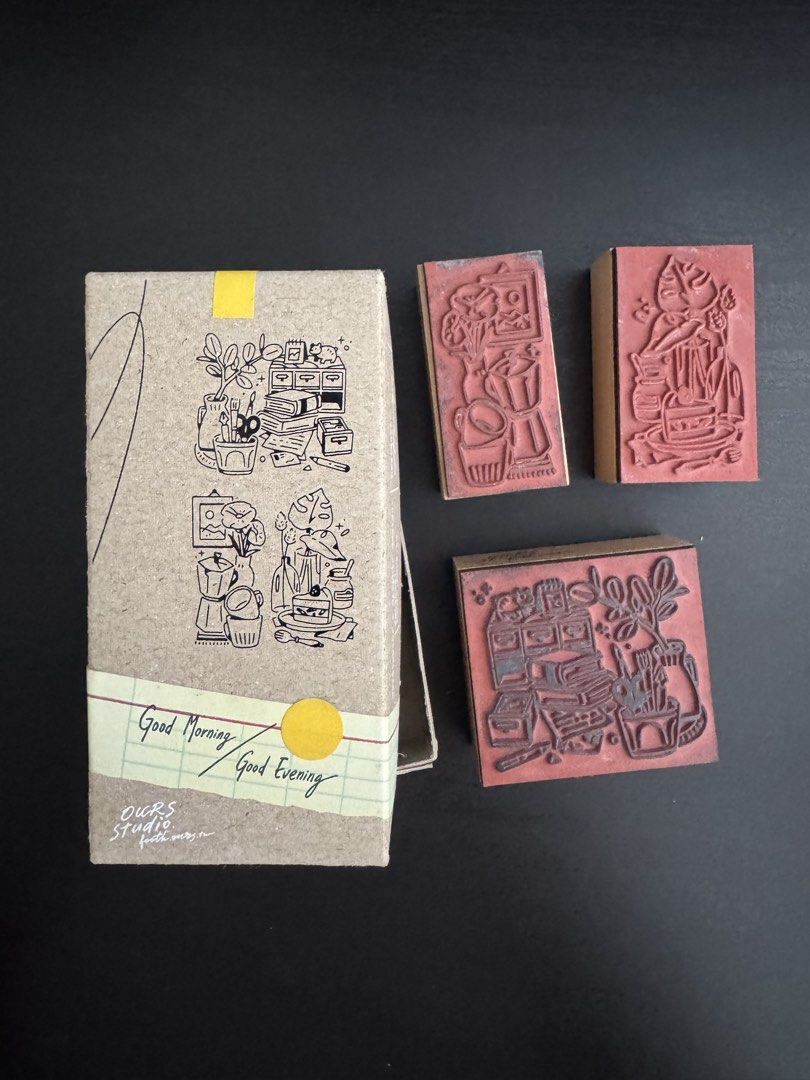 OURS Studio Good Morning / Good Evening Rubber Stamp Set (Category: Craft Supplies & Tools) located in Manila. Submitted by cyu12 (Listing ID 1468474658, Image 2). Description: - Brand: OURS Studio - Item: Good Morning / Good Evening rubber stamp set - Includes: 3 wooden-mounted stamps with botanical and lifestyle illustrations - Packaging: Original cardboard storage box with illustrated sleeve - Ideal for: Journaling, planners, and craft project