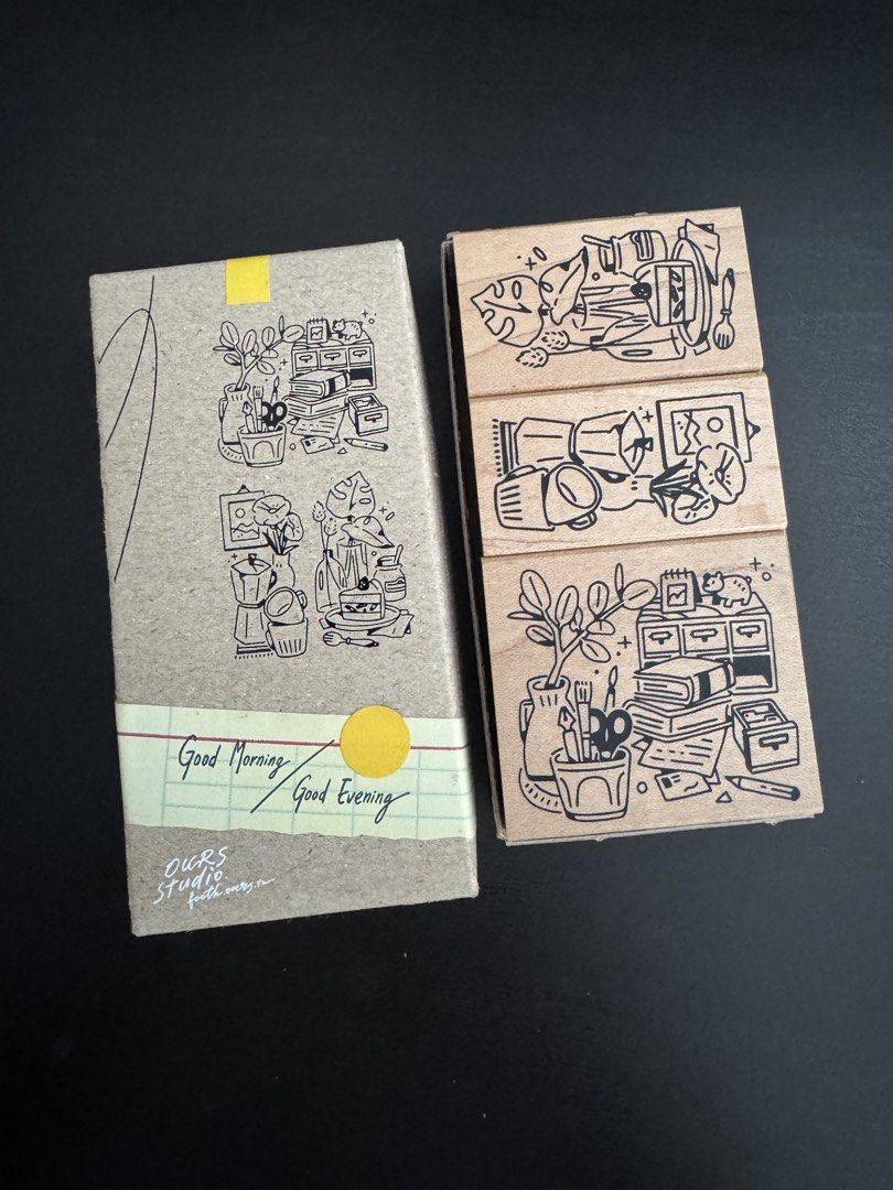 OURS Studio Good Morning / Good Evening Rubber Stamp Set (Category: Craft Supplies & Tools) located in Manila. Submitted by cyu12 (Listing ID 1468474658, Image 1). Description: - Brand: OURS Studio - Item: Good Morning / Good Evening rubber stamp set - Includes: 3 wooden-mounted stamps with botanical and lifestyle illustrations - Packaging: Original cardboard storage box with illustrated sleeve - Ideal for: Journaling, planners, and craft project
