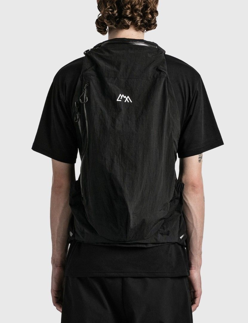 Outdoor Garment Step Out Vest (Category: Backpacks) located in Puerto Princesa. Submitted by jercksthriftph (Listing ID 1468391749, Image 1). Description: Outdoor Garment Step Out Vest - Sleek black technical backpack vest hybrid - Made from durable, water-resistant crinkled nylon - Multiple zipped compartments on front and sides for easy storage - Adjustable straps with heavy-duty buckles for a secure fit - Distinctive white mountain-style logo 