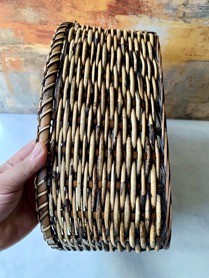 Oval Handwoven Rattan or Wicker Storage (Category: Storage Boxes & Baskets) located in Tandag. Submitted by jeason_22 (Listing ID 1468338692, Image 3). Description: oval handwoven rattan or wicker storage basket featuring a braided rim and two-tone brown and natural weave. .