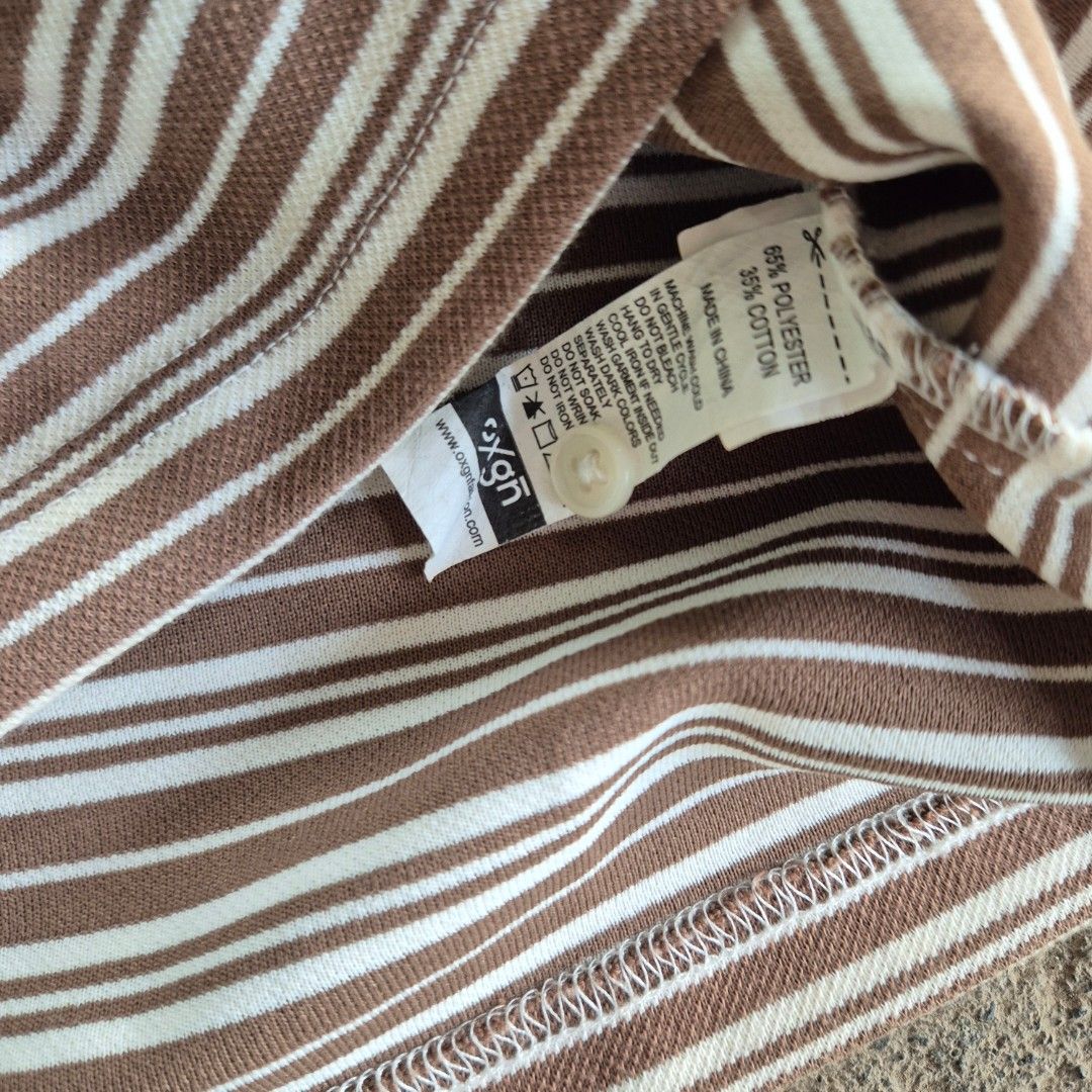 OXGN Striped Polo (Category: Tshirts & Polo Shirts ) located in General Santos City (Dadiangas). Submitted by madeby.ryb (Listing ID 1468450999, Image 3). Description: •Never worn💯 •Classic brown stripes × White collar •size: 18-19W × 25L – Small •Clean & Fresh — no flaws.