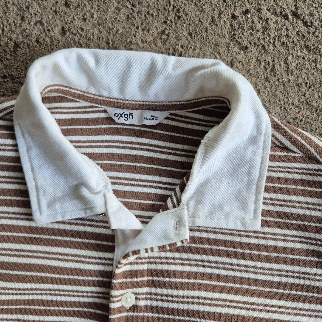 OXGN Striped Polo (Category: Tshirts & Polo Shirts ) located in General Santos City (Dadiangas). Submitted by madeby.ryb (Listing ID 1468450999, Image 2). Description: •Never worn💯 •Classic brown stripes × White collar •size: 18-19W × 25L – Small •Clean & Fresh — no flaws.