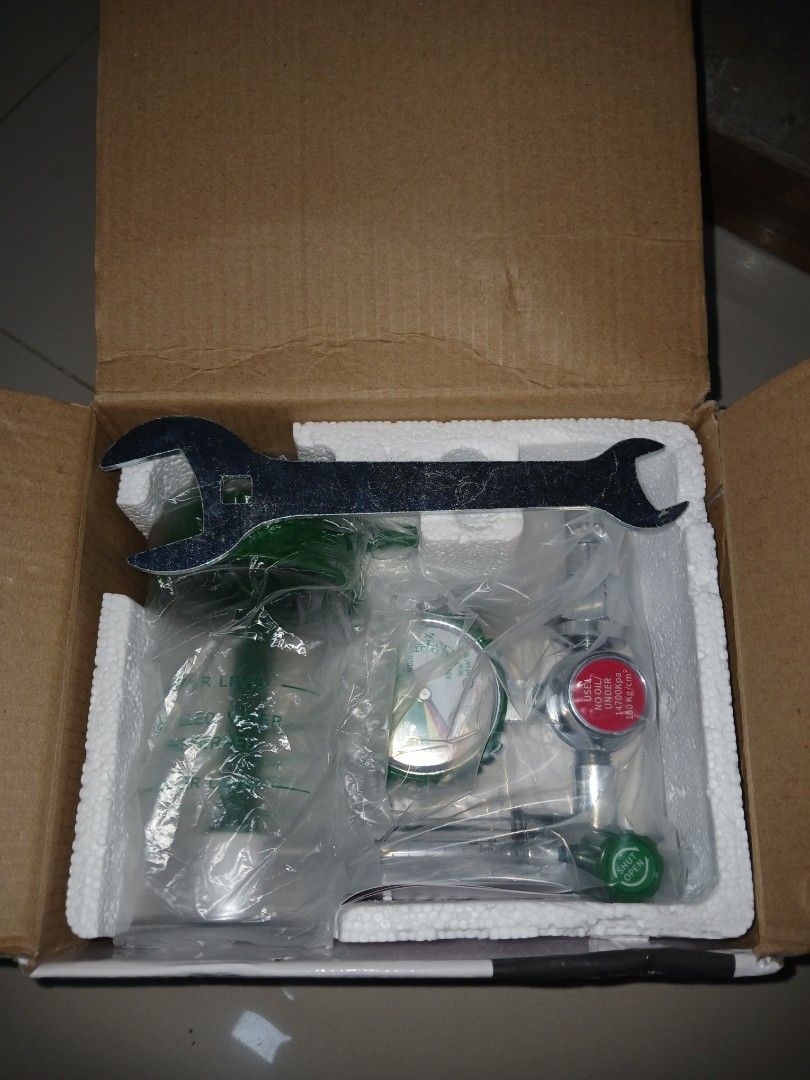 Oxygen Regulator Flowmeter Kit with Wrench in Box (Category: Medical Supplies & Tools) located in Manila. Submitted by chrism3o (Listing ID 1468387582, Image 2). Description: - Brand new and unused oxygen pressure regulator and flowmeter kit - Stored safely in original cardboard box with protective styrofoam and clear plastic wrapping - Includes pressure gauge and control valve - Comes with a green humidifier bottle - Includes a matching metal sp