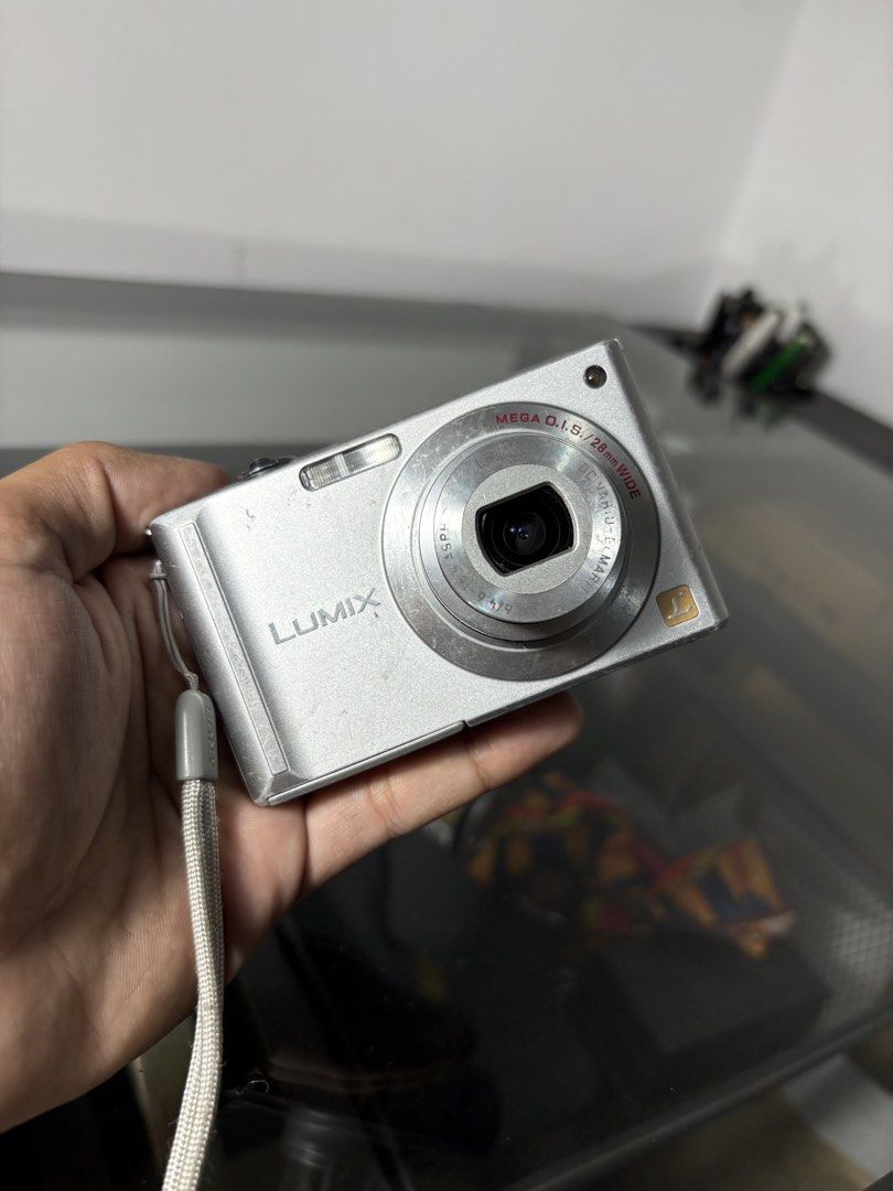 PANASONIC LUMIX DMC-FX55 DIGICAM (Category: Cameras) located in Calamba. Submitted by absentmindeadz (Listing ID 1468472651, Image 1). Description: PANASONIC LUMIX DMC-FX55 DIGITAL CAMERA * Sensor: 8.1-megapixel CCD sensor * Lens: Leica DC Vario-Elmarit 3.6x wide-angle optical zoom (28–100mm equivalent) with f/2.8 max aperture * Image Stabilization: MEGA O.I.S. * Display: Large 3-inch LCD screen with Intelligent LCD backlighting boost * ISO Range