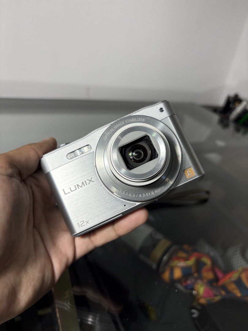 PANASONIC LUMIX DMC-SZ8 DIGICAM (Category: Cameras) located in Calamba. Submitted by absentmindeadz (Listing ID 1468472912, Image 1). Description: PANASONIC LUMIX DMC-SZ8 DIGITAL CAMERA * Sensor: 16-megapixel 1/2.3-inch CCD sensor * Lens: 12x optical zoom lens (35mm equivalent: 24–288mm) with built-in optical image stabilization * Display: 3.0-inch LCD screen with 460k-dot resolution * Video: HD 720p video recording at 30 fps (1280 x 720p) * Feat