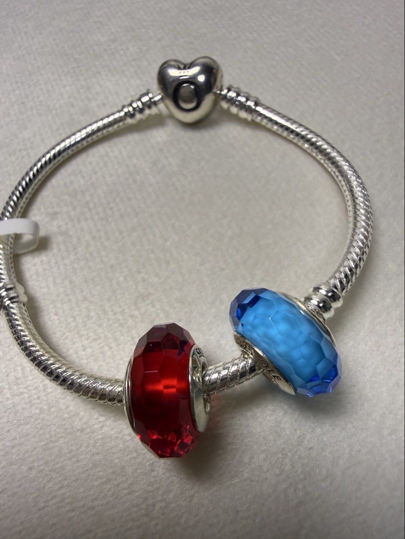 Pandora Bracelet (S2) (Category: Bracelets) located in Baguio. Submitted by mooi.kuryba (Listing ID 1468462757, Image 2). Description: PANDORA Moments Heart Clasp Snake Chain Bracelet✨ PRELOVED - lightly used ⚡️ Comes with: 1 Blue Faceted Murano Glass Charm 💙 1 Red Fascinating Faceted Murano Glass Charm ❤️ (All Original Pandora ALE S925) 15 CM | 1 set only @4,800 PHP This timeless piece adds a touch of sparkle and elegance to any outfit! 🌟 Mess