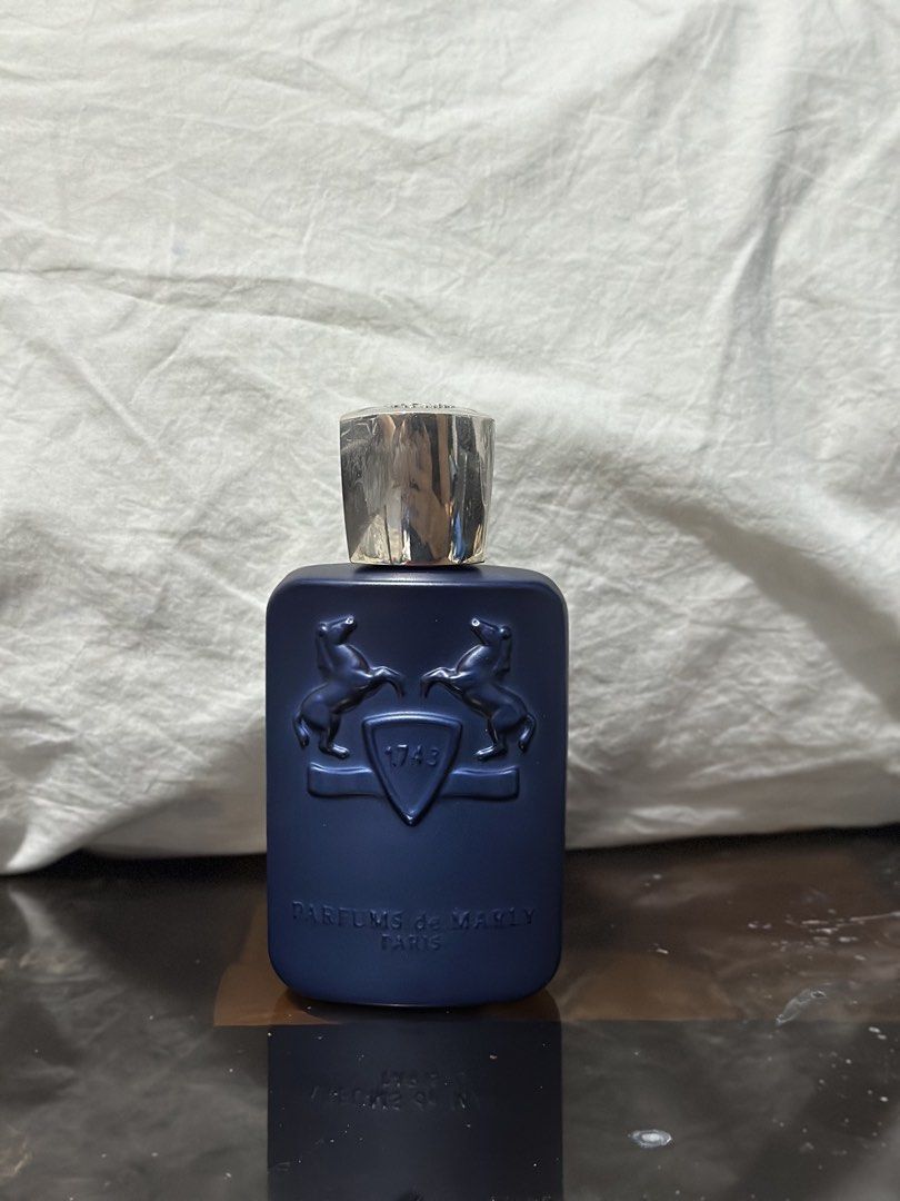 Parfums de Marly Layton Tester 125ml (Category: Fragrance & Deodorants) located in Makati City. Submitted by charmelo21 (Listing ID 1468357512, Image 1). Description: - Authentic Parfums de Marly Layton tester bottle - Size: 125ml with rare blue matte finish -75 ml remaining - Fragrance Notes: Apple, bergamot, lavender, jasmine, vanilla, pepper, guaiac wood, and patchouli - Design: Silver cap with embossed horse logo and clearly printed tester te