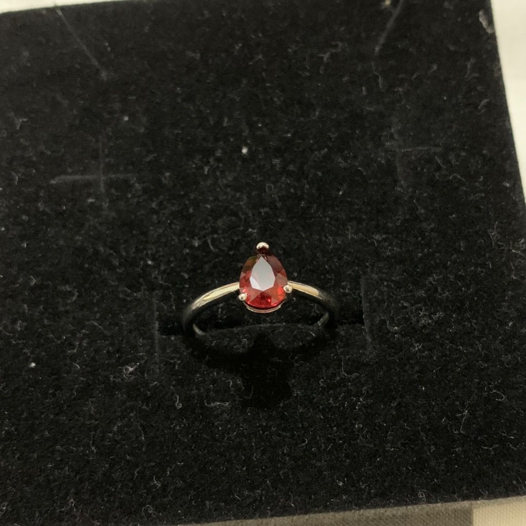Pear-Shaped Red Garnet Adjustable Ring (Category: Rings) located in Quezon City. Submitted by itscxyy (Listing ID 1468341789, Image 2). Description: - Not S925 - Adjustable open band design ensures a comfortable fit for most fingers - Perfect statement piece for any occasion.