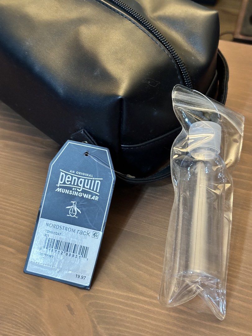 Penguin Black Toiletry Bag (2 PCS) (Category: Belt bags, Clutches and Pouches) located in Baguio. Submitted by sammieong (Listing ID 1468480819, Image 2). Description: Take all! 2 pcs of Penguin toiletry bag. One is brand new, the other is lightly used. Both just need a bit of cleaning. Rfs: Not using it much :( .