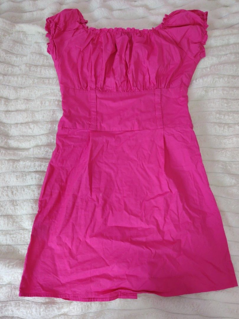 Pink Button-Front Short Dress with Pockets (Category: Dresses) located in Mabalacat. Submitted by Jackikay.PreLoved (Listing ID 1468420540, Image 2). Description: Bright pink mini dress in soft cotton, Features a square neckline, puffed sleeves, front buttons, bust detailing, a fitted waist, and handy hip pockets. Cute, comfy, and ready to wear!.