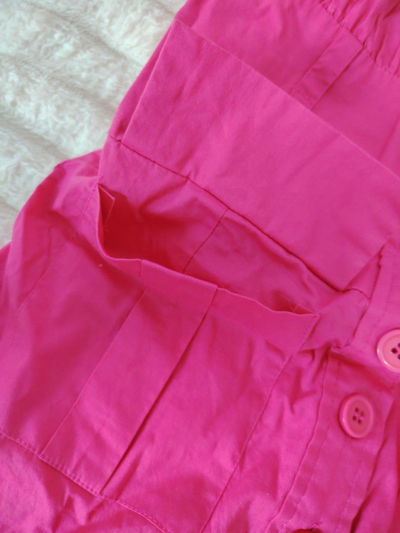 Pink Button-Front Short Dress with Pockets (Category: Dresses) located in Mabalacat. Submitted by Jackikay.PreLoved (Listing ID 1468420540, Image 3). Description: Bright pink mini dress in soft cotton, Features a square neckline, puffed sleeves, front buttons, bust detailing, a fitted waist, and handy hip pockets. Cute, comfy, and ready to wear!.