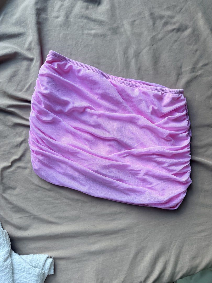 Pink Ruched Mesh Mini Skirt Y2K Bodycon (Category: Skirts) located in Manila. Submitted by lucipurrpreloved (Listing ID 1468339788, Image 2). Description: Fitted only did not use - Color: Bright pink - Material: Super stretchy mesh with all-over ruching - Fit: Low-rise, mini length - Condition: Worn once, like new - Styling: Great for nights out or casual daytime wear, pairs easily with crop tops.