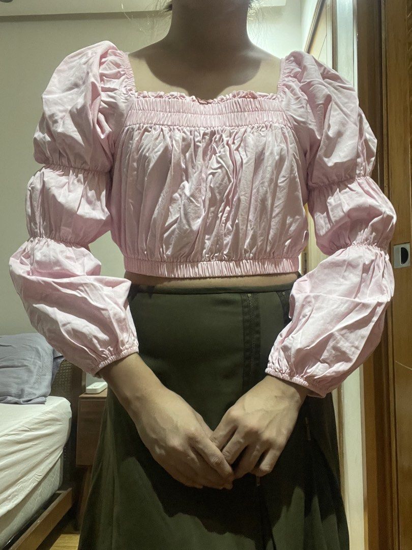 Pink Square Neck Puff bubble Sleeve Crop Top (Category: Blouses) located in Manila. Submitted by gabbyrella (Listing ID 1468463434, Image 1). Description: - Color: Light Pink - Style: Cottagecore / Sweet - Neckline: Square neck - Details: Smocked bodice, long puff sleeves with ruffles, elastic hem and cuffs - Fit: Crop top, pairs perfectly with high-waisted skirts or pants.