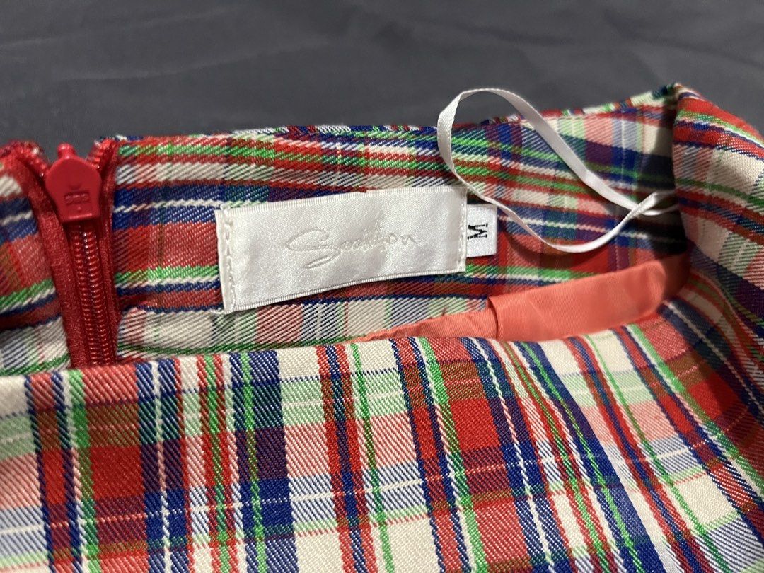 Plaid Mini Skirt (Category: Skirts) located in Quezon City. Submitted by ayapiaya (Listing ID 1468317212, Image 2). Description: W: 26-27 L: 17 - Brand/Style: plaid skirt in a classic tartan pattern (red, blue, green, and white) - Size: Small (High-waist, short length) - Features: Structured fabric, back zipper closure, and inner hanging loops - Condition/Use: Great everyday piece, easy to style.