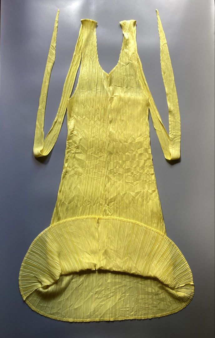 Pleats Please - Midi Dress (Category: Luxury Apparel) located in Angeles City. Submitted by rachelzane (Listing ID 1468338767, Image 1). Description: Excellent Condition SIZE: 2 on tag ISSUE: none DIMENSION: WIDTH : 15 inches LENGTH: 45 inches NOTE: • Color may vary due to lightning • Check measurements written in the description • Ask any questions before sending offers • Offers are welcome only when you are ready and sure about the deal • I shi