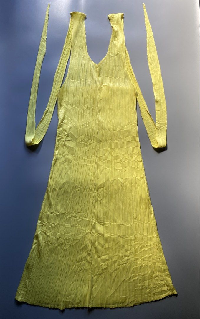 Pleats Please - Midi Dress (Category: Luxury Apparel) located in Angeles City. Submitted by rachelzane (Listing ID 1468338767, Image 2). Description: Excellent Condition SIZE: 2 on tag ISSUE: none DIMENSION: WIDTH : 15 inches LENGTH: 45 inches NOTE: • Color may vary due to lightning • Check measurements written in the description • Ask any questions before sending offers • Offers are welcome only when you are ready and sure about the deal • I shi