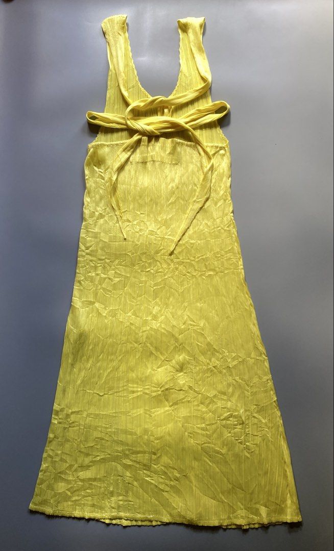 Pleats Please - Midi Dress (Category: Luxury Apparel) located in Angeles City. Submitted by rachelzane (Listing ID 1468338767, Image 3). Description: Excellent Condition SIZE: 2 on tag ISSUE: none DIMENSION: WIDTH : 15 inches LENGTH: 45 inches NOTE: • Color may vary due to lightning • Check measurements written in the description • Ask any questions before sending offers • Offers are welcome only when you are ready and sure about the deal • I shi
