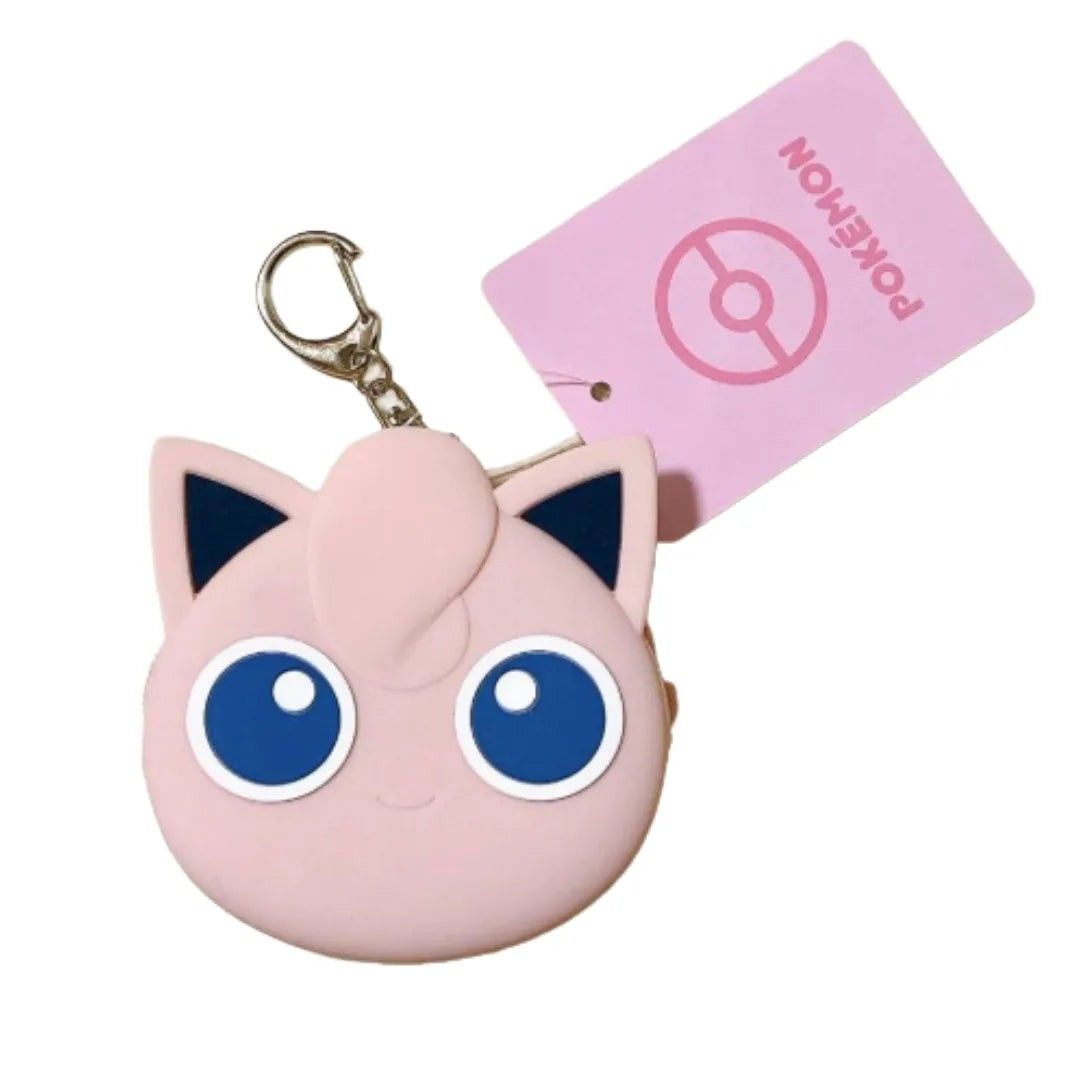 Pokemon Jigglypuff Silicone Mini Pouch Keychain (Category: Character Goods) located in Quezon City. Submitted by curatedbymissgee (Listing ID 1468296087, Image 2). Description: - Official Pokémon merchandise from Japan - Genuine Jigglypuff silicone mini pouch with original paper tag - Features cute Jigglypuff face design on front and embossed text on back - Secure zip closure to keep small items safe - Convenient keychain attachment to easily hoo