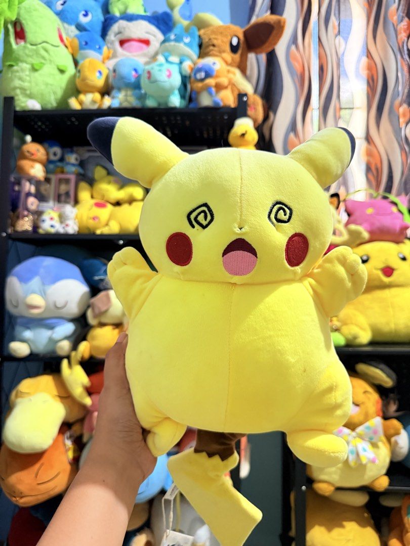 Pokemon Pikachu Dizzy Face Fat Plush Toy (Category: Plushies & Soft Toys) located in Cavite. Submitted by projectplushie (Listing ID 1468383225, Image 1). Description: - Super soft and squishy round Pikachu plush - Features a funny dizzy eyes and open mouth expression - Bright yellow body with iconic brown tail stripes - Perfect addition to any Pokemon plush collection - WITH FLAWS (DISCOLORED BACK).